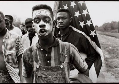 Bruce Davidson, American, 1933. A Young Man with “Vote” Painted on His Forehead during the Selma March, Alabama, 1965.