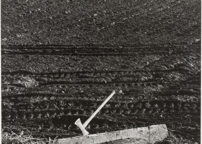 Minor White, American, 1908 - 1976. Axe and Plowed Field, 1948.